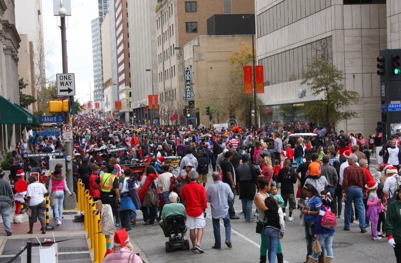 Crowed people watch Christmas parade in downtown Dallas, 2012. Crowed people watch Christmas parade in downtown Dallas, 2012.