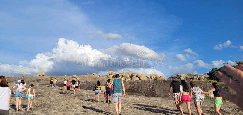 Cabeceiras, Para�ba, Brazil 01/14/2023 Tourists climbing the rocks path. Lajedo Pai Mateus. Cabeceiras, Para�ba, Brazil 01/14/2023 Tourists climbing the rocks path. Lajedo Pai Mateus