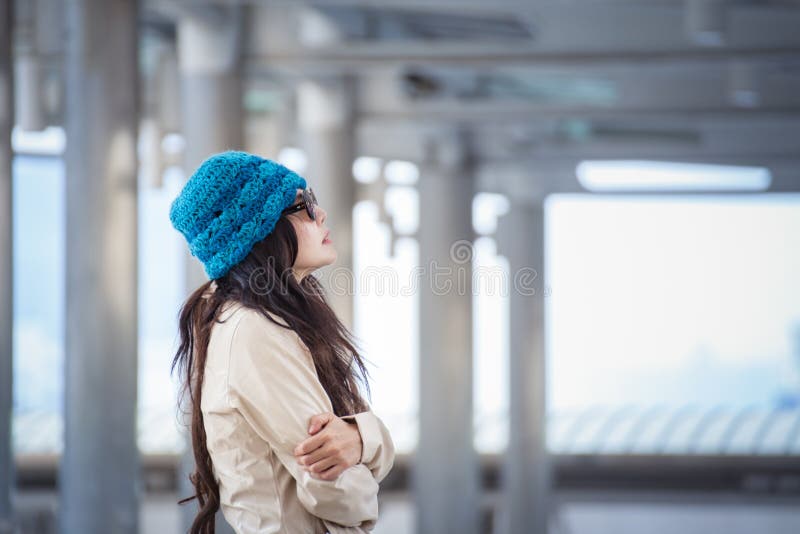 Woman hugging herself and looking away with winter lonely emotional . lonely concept of yourself body. Woman hugging herself and looking away with winter lonely emotional . lonely concept of yourself body