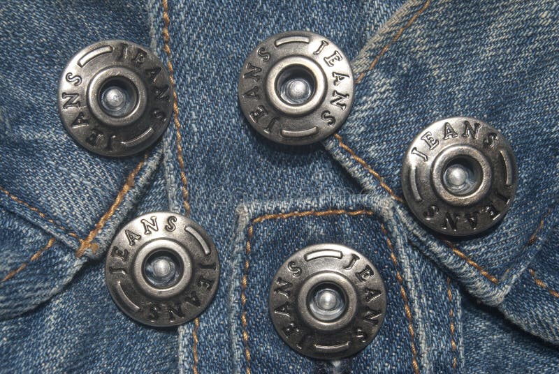 Jeans and buttons. A conceptual image. Jeans and buttons. A conceptual image