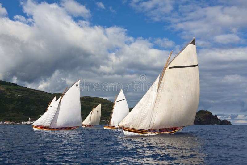 Ancient Whaling boats on a sailing race in pico island Azores. Ancient Whaling boats on a sailing race in pico island Azores