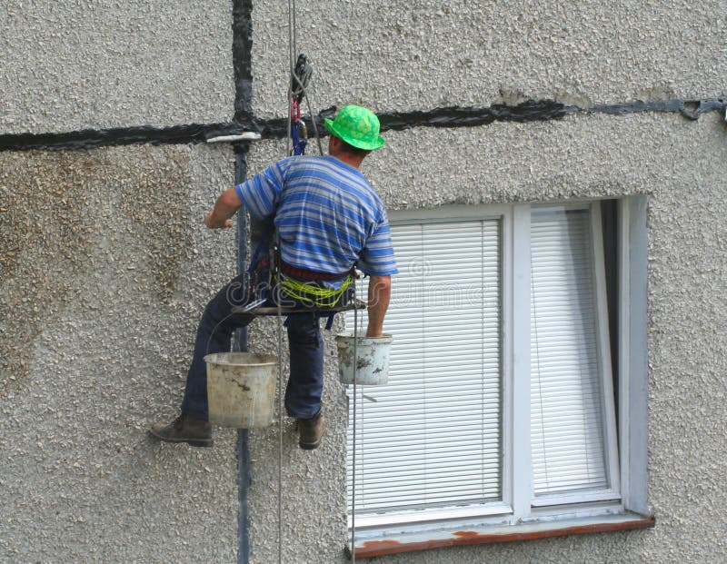 Renovation worker on a block of flats #2. Renovation worker on a block of flats #2