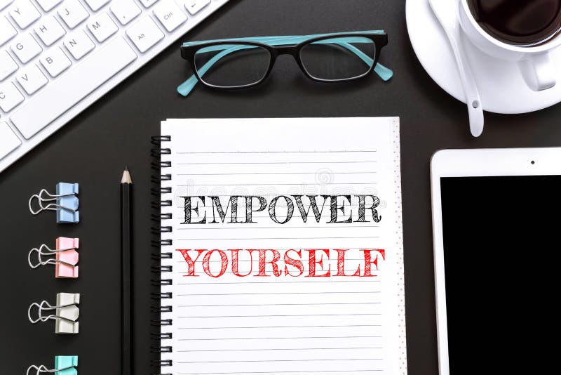 Text Empower yourself on white paper background. Text Empower yourself on white paper background.