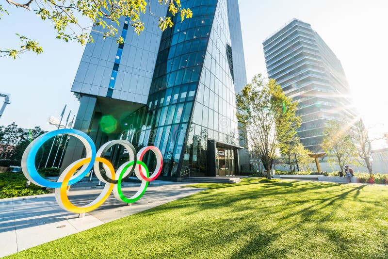 Tokyo, Japan - Nov 1, 2019: Olympic symbol logo at Olympic Museum near Japan New National Stadium, Shinjuku. Tokyo Summer Olympic 2020 host venue, Japanese landmark, international sport event concept. Tokyo, Japan - Nov 1, 2019: Olympic symbol logo at Olympic Museum near Japan New National Stadium, Shinjuku. Tokyo Summer Olympic 2020 host venue, Japanese landmark, international sport event concept