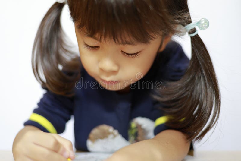 日本女孩画着色素书 库存图片