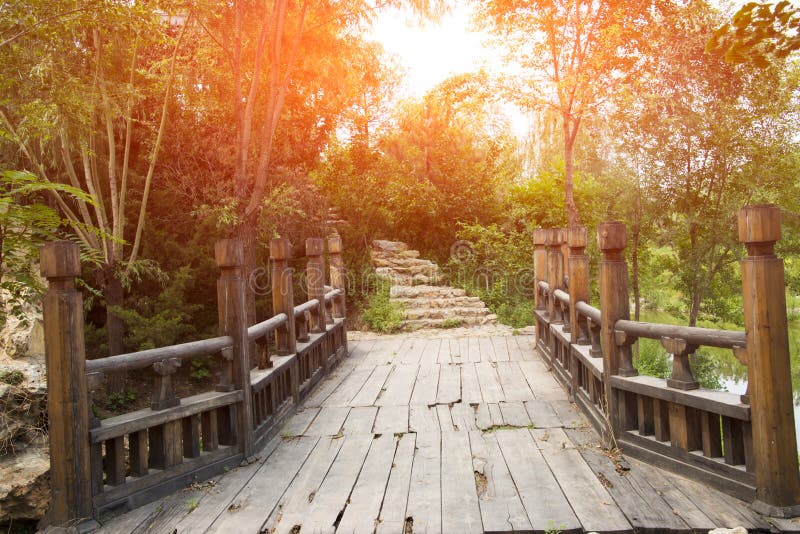 Asian China, Beijing, elm village park, the setting sun of the bridge, the environment elegant, charming scenery. Asian China, Beijing, elm village park, the setting sun of the bridge, the environment elegant, charming scenery