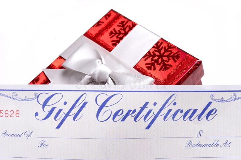 A gifts with bows with a gift certificate over white background. A gifts with bows with a gift certificate over white background