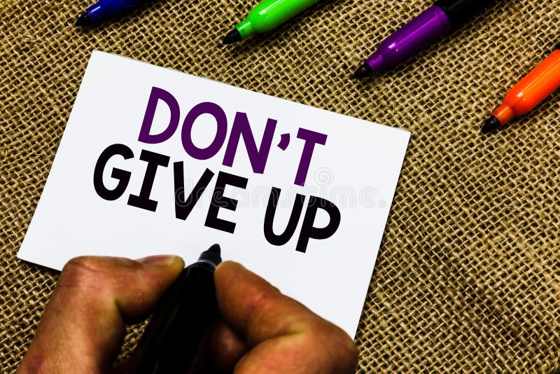 Writing note showing Don t not Give Up. Business photo showcasing Determined Persevering Continue to Believe in Yourself Man hand holding marker white paper communicating idea Jute background. Writing note showing Don t not Give Up. Business photo showcasing Determined Persevering Continue to Believe in Yourself Man hand holding marker white paper communicating idea Jute background