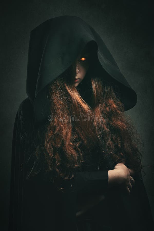 Fire witch with black robe . Dark fantasy portrait. Fire witch with black robe . Dark fantasy portrait