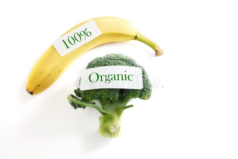 Broccoli and banana with 100 percent organic labels. Broccoli and banana with 100 percent organic labels