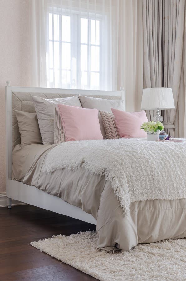 Luxury bedroom with pink pillows on bed at home. Luxury bedroom with pink pillows on bed at home