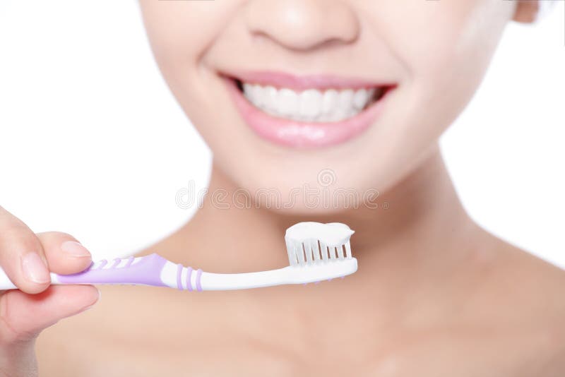 Close up of Young smiling woman cleaning teeth with toothbrush, asian beauty model. Close up of Young smiling woman cleaning teeth with toothbrush, asian beauty model