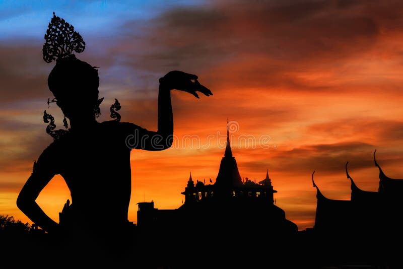 Thai dance woman with temple and pagoda in thailand background silhouette. Thai dance woman with temple and pagoda in thailand background silhouette