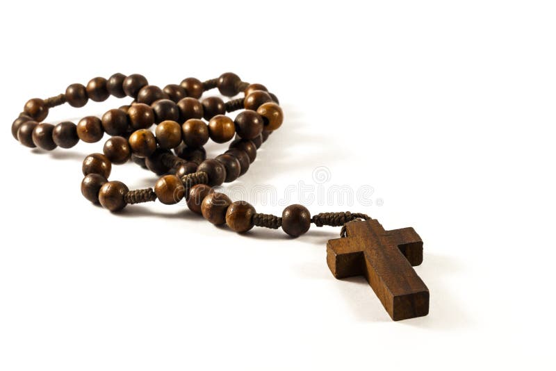 Wood rosary and cross with isolated background. Wood rosary and cross with isolated background