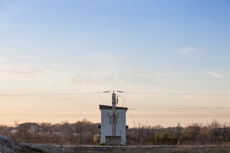 Picture of a traction subtstation, European standard, in front of an electrified railroad line. A traction substation, traction current converter plant or traction power substation TPSS is an. ...Picture of a traction subtstation, European standard, in front of an electrified railroad line. A traction substation, traction current converter plant or traction power substation TPSS is an