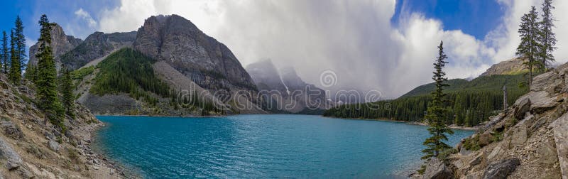 Panorama of Moraine Lake in Banff National Park Alberta Canada on a stormy day. Panorama of Moraine Lake in Banff National Park Alberta Canada on a stormy day