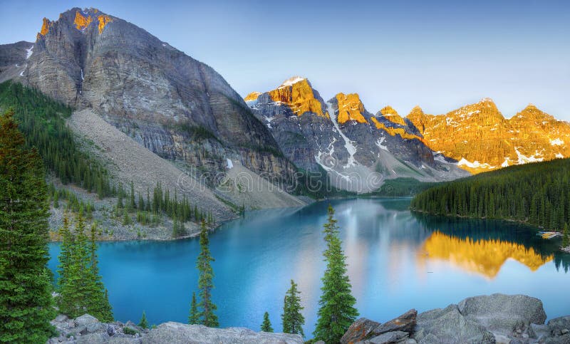 Moraine Lake - Taken at the peak of color during the morning sunrise. Banff National park. Alberta, Canada. Moraine Lake - Taken at the peak of color during the morning sunrise. Banff National park. Alberta, Canada.