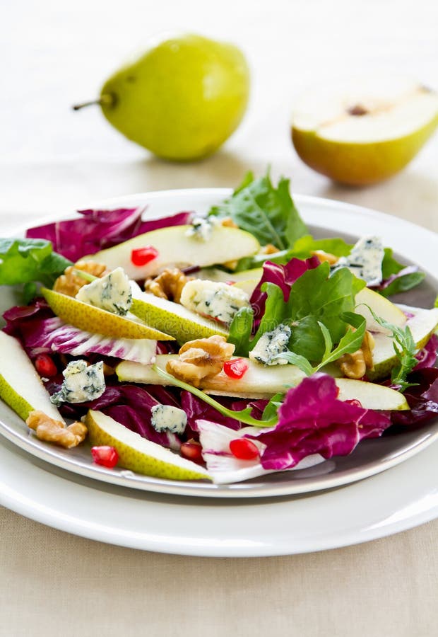 Pear,Pomegranate,with Blue cheese,walnut,radicchio and rocket salad. Pear,Pomegranate,with Blue cheese,walnut,radicchio and rocket salad