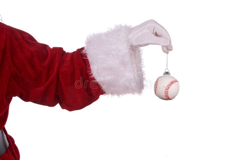 Santa Claus with baseball ornament in his white gloved hand. Santa Claus with baseball ornament in his white gloved hand