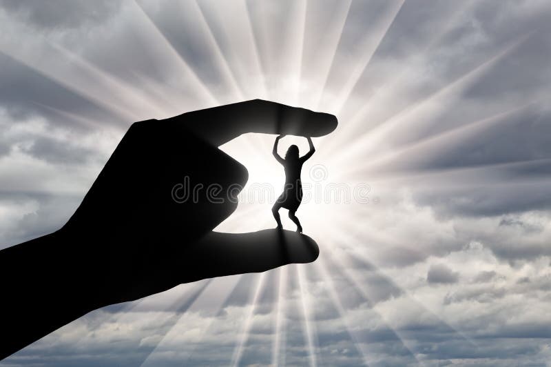 Bullying work. Silhouette of a hand holds between the fingers a woman who squirts against a cloudy sky. Workplace bullying concept. Bullying work. Silhouette of a hand holds between the fingers a woman who squirts against a cloudy sky. Workplace bullying concept