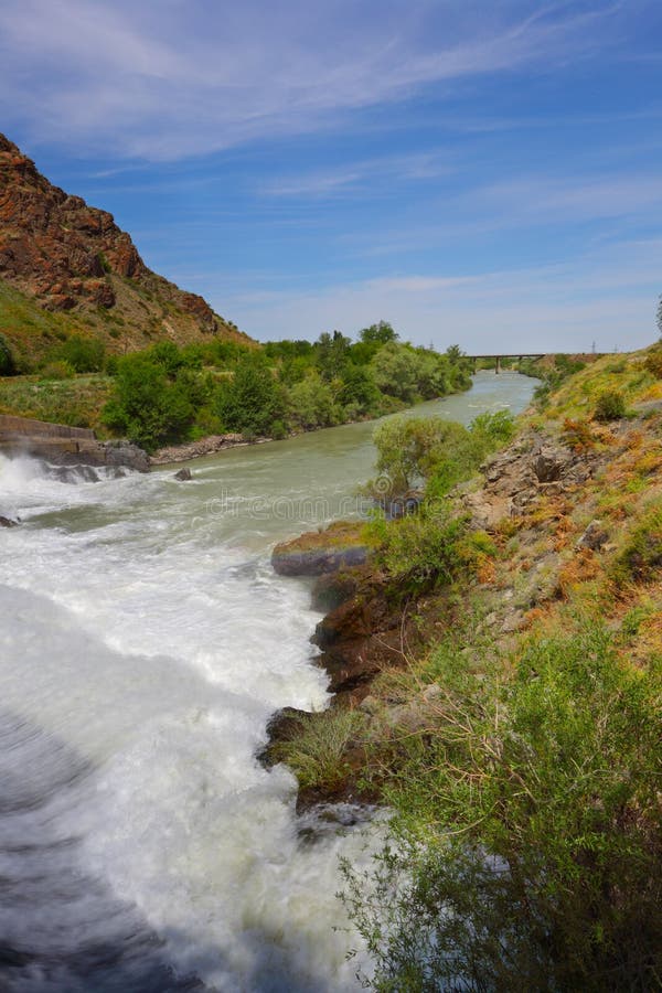 Dam on the mountain river. Dam on the mountain river