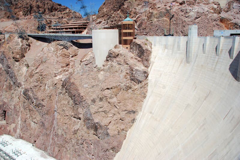 White cement Hoover Dam in a sunny day. White cement Hoover Dam in a sunny day