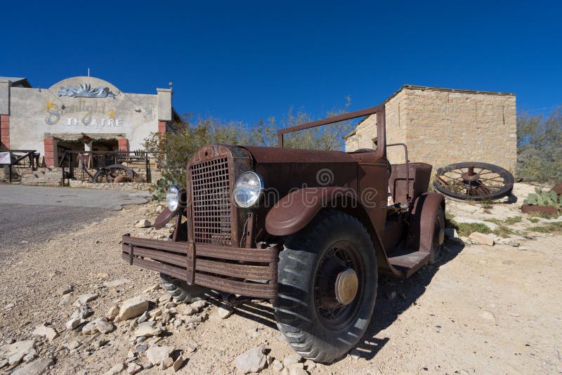 December 14, 2015 Terlingua, Texas: car wreck in front of , the Chisos Movie Theater constructed in the 1930â€™s, nowadays functioning as a restaurant for tourists visiting the ghost town. December 14, 2015 Terlingua, Texas: car wreck in front of , the Chisos Movie Theater constructed in the 1930â€™s, nowadays functioning as a restaurant for tourists visiting the ghost town