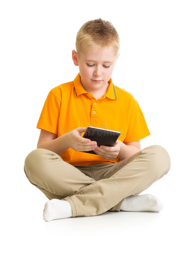 沉思孩子被隔绝的男孩坐与片剂个人计算机的或phablet 库存图片