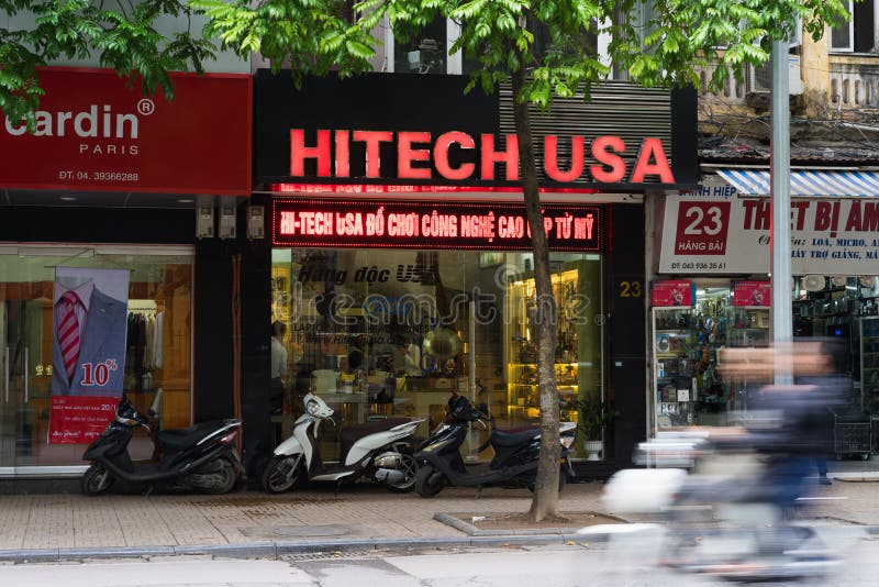 Hanoi, Vietnam - Nov 16, 2014: Front view of electronic store in Hang Bai street. Vietnam become potential high technology product market, seeing many stores risen nowadays. Hanoi, Vietnam - Nov 16, 2014: Front view of electronic store in Hang Bai street. Vietnam become potential high technology product market, seeing many stores risen nowadays.