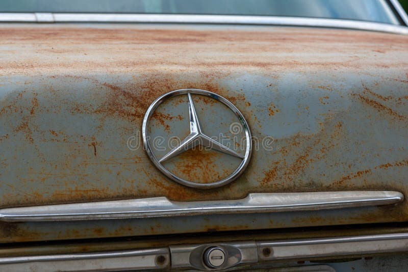 POTTERVILLE, MI - JUNE 23rd 2021: 1976 Rusty Mercedes Benz trunk. High quality photo. POTTERVILLE, MI - JUNE 23rd 2021: 1976 Rusty Mercedes Benz trunk. High quality photo