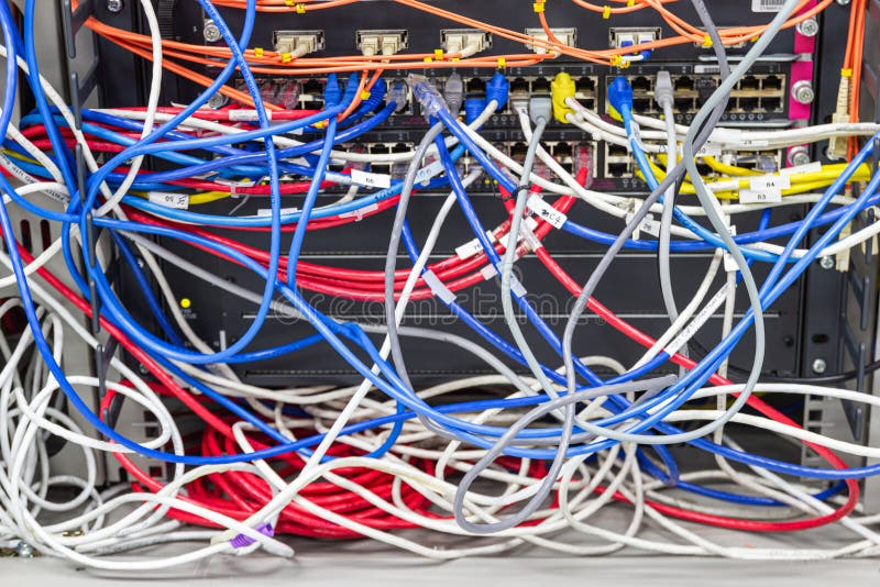 Bangkok Thailand, June 25, 2019:- The Cable Network in Server room A bad case of cable spaghetti, The worst cable mess, concept Cable management. Bangkok Thailand, June 25, 2019:- The Cable Network in Server room A bad case of cable spaghetti, The worst cable mess, concept Cable management