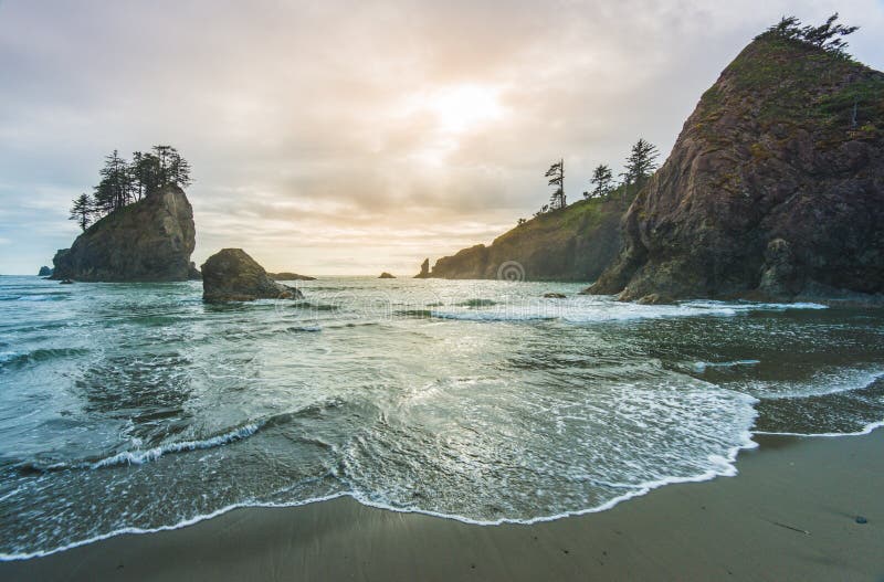 Scenic view of sea stack in Second beach when sunset,in mt Olympic National park,Washington,usa. Scenic view of sea stack in Second beach when sunset,in mt Olympic National park,Washington,usa..