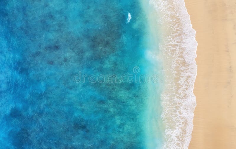 Beach as a background from top view. Turquoise water background from top view. Summer seascape from air. Bali island, Indonesia. Travel - image. Beach as a background from top view. Turquoise water background from top view. Summer seascape from air. Bali island, Indonesia. Travel - image