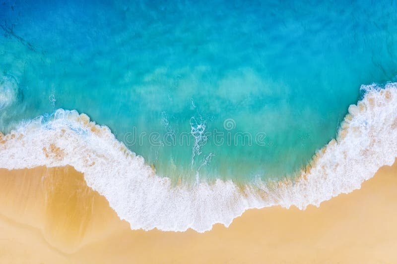 Beach and large ocean waves. Coast as a background from top view. Blue water background from drone. Summer seascape from air. Travel image. Beach and large ocean waves. Coast as a background from top view. Blue water background from drone. Summer seascape from air. Travel image