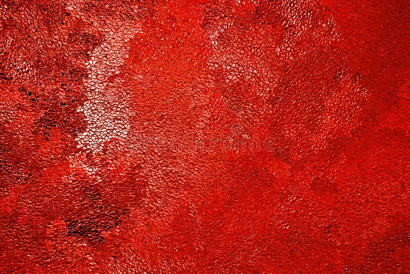 Abstract grainy background in deep red. Surface of ice crystals close-up. Tinted vivid backdrop or wallpaper. Chaotic spots and streaks. Passionate and sexy color. Macro. Abstract grainy background in deep red. Surface of ice crystals close-up. Tinted vivid backdrop or wallpaper. Chaotic spots and streaks. Passionate and sexy color. Macro
