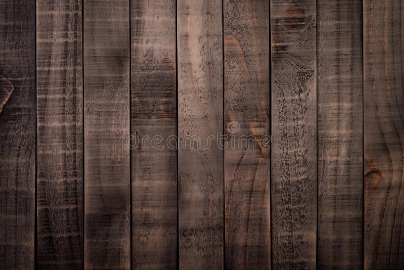 Top view of dark brown and black wood texture background, wooden table. Top view of dark brown and black wood texture background, wooden table.