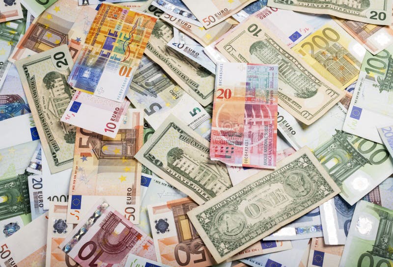 Background of lots of bills of mixed currency and value of euro, dollars and swiss francs. Background of lots of bills of mixed currency and value of euro, dollars and swiss francs