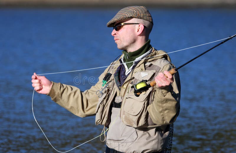 Fly-fisher in action on the Swedish westcoast. Fly-fisher in action on the Swedish westcoast