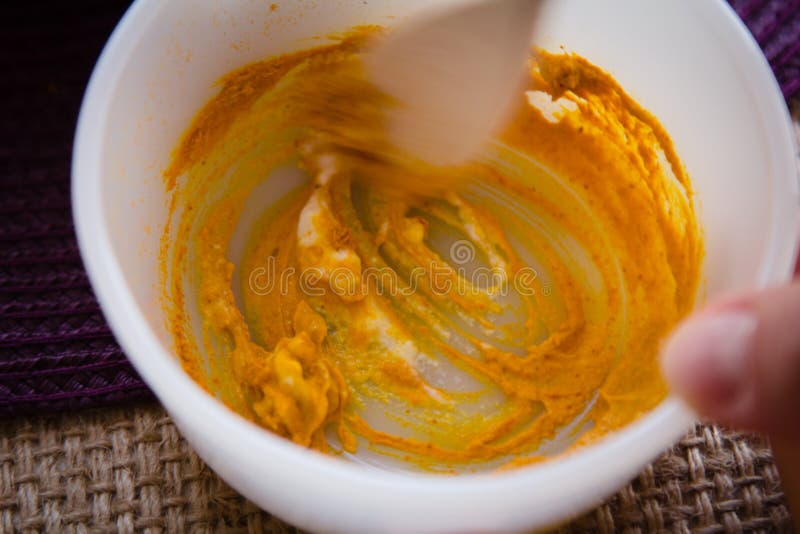 Making of the Turmeric face mask receipt set for SPA resort. Ingredients: -1/2 teaspoon turmeric powder -½ teaspoon organic apple cider vinegar -one tablespoon of organic, raw, bee honey -½ teaspoon milk or yogurt -one drop lemon essential oil or fresh lemon juice for skin brightening effect. Making of the Turmeric face mask receipt set for SPA resort. Ingredients: -1/2 teaspoon turmeric powder -½ teaspoon organic apple cider vinegar -one tablespoon of organic, raw, bee honey -½ teaspoon milk or yogurt -one drop lemon essential oil or fresh lemon juice for skin brightening effect