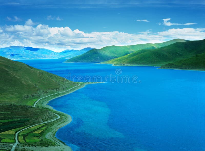 Yamdrok Tso Lake,located in Nagarze County, is at an altitude of 4,441 meters above sea level.it is 130 kilometers fromeast to west and 70 kilometers from north to south.It is one of the three holy lakes in Tibet. Yamdrok Tso Lake,located in Nagarze County, is at an altitude of 4,441 meters above sea level.it is 130 kilometers fromeast to west and 70 kilometers from north to south.It is one of the three holy lakes in Tibet.