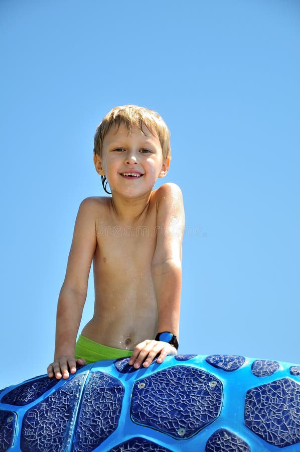 Little boy wants to get out from swimming pool. Little boy wants to get out from swimming pool