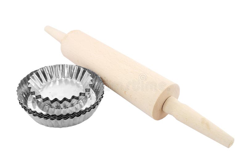 Rolling pin and baking tins isolated on white. Rolling pin and baking tins isolated on white