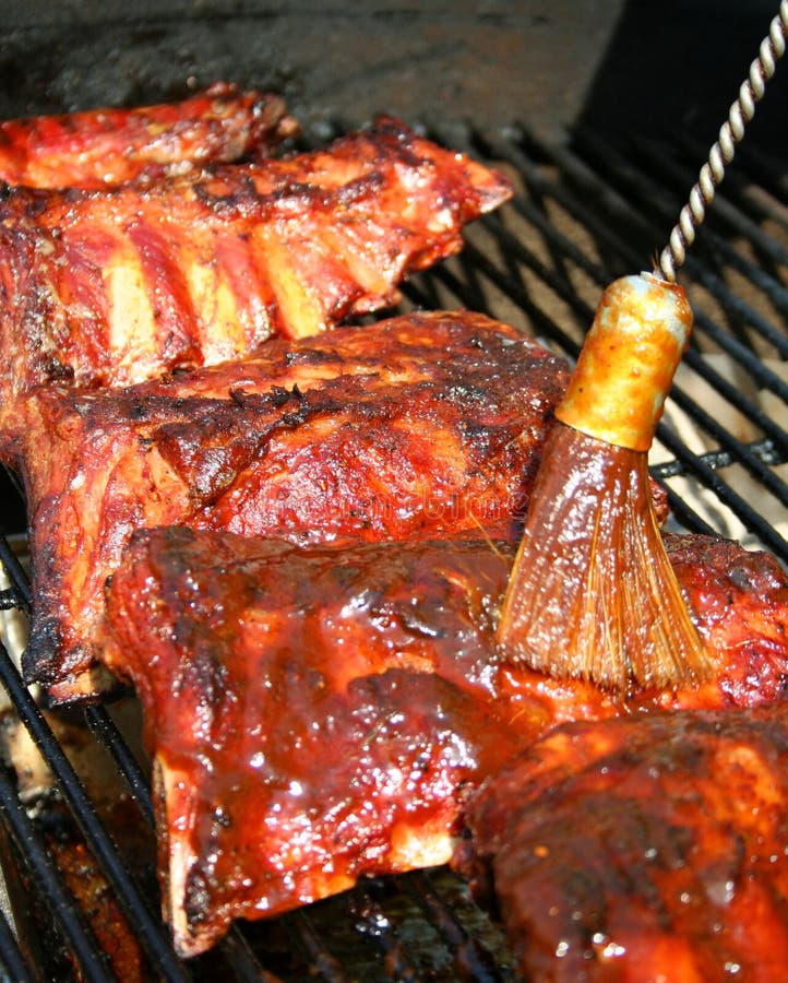 烹调格栅猪排的烤肉 免版税库存照片 烹调格栅猪排的烤肉 免版税库存照片