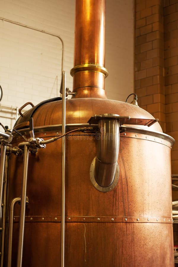 Copper boil kettle in the American brewery. Copper boil kettle in the American brewery