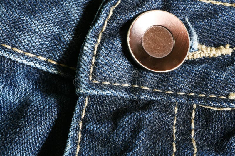 Jeans and button of the clothing. Jeans and button of the clothing