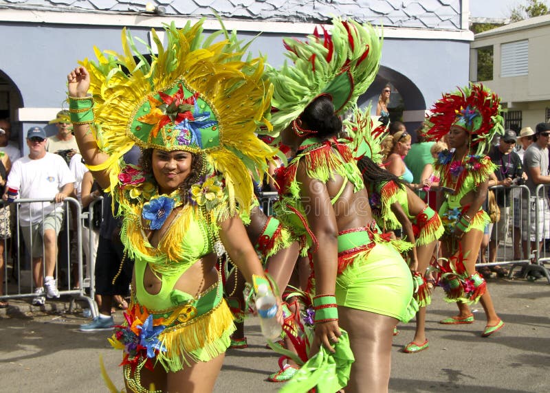 People enjoying the carnival parade in Frederiksted during the St. Croix Christmas Festival, US Virgin Islands. People enjoying the carnival parade in Frederiksted during the St. Croix Christmas Festival, US Virgin Islands.