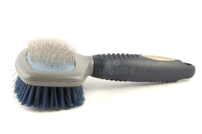 Dog grooming brush with soft and hard bristles. Dog grooming brush with soft and hard bristles