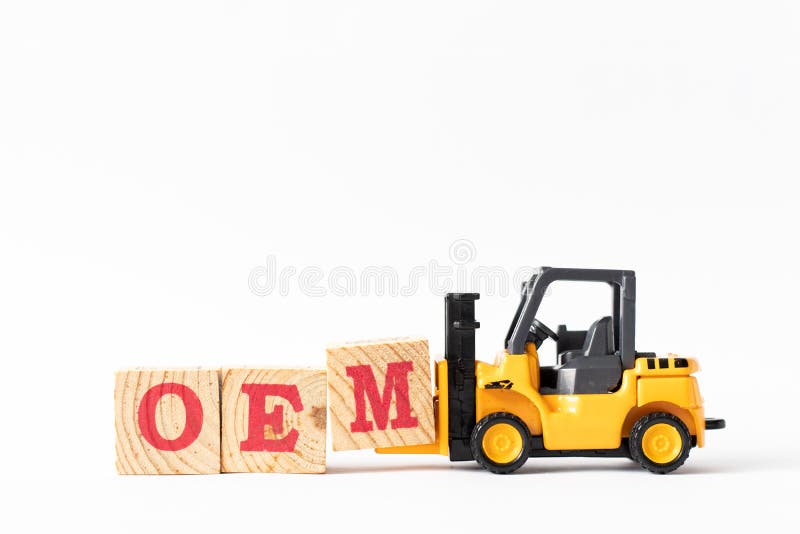 Toy forklift hold wood block M to complete word OEM Abbbreviation of Original Equipment Manufacturer on white background. Toy forklift hold wood block M to complete word OEM Abbbreviation of Original Equipment Manufacturer on white background