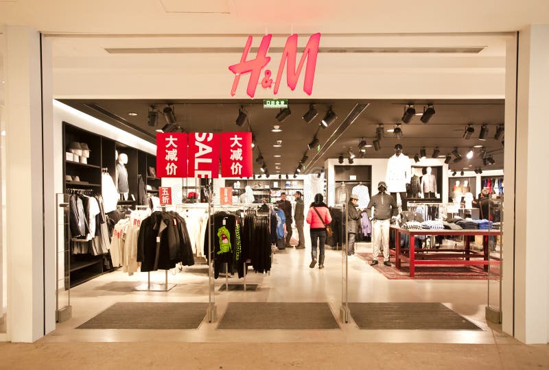 CHONGQING, CHINA - JAN 22: H&M store in Chongqing on Jan 22, 2011. As of 2010, H&M has opened 31 stores in China. CHONGQING, CHINA - JAN 22: H&M store in Chongqing on Jan 22, 2011. As of 2010, H&M has opened 31 stores in China.