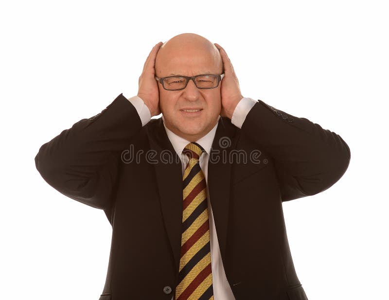 Half body portrait of bald businessman covering ears, hear no evil concept, white background. Half body portrait of bald businessman covering ears, hear no evil concept, white background.